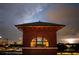 Charming brick building with an arched window showcases stunning city skyline views with dramatic clouds at 170 Boulevard Se # H523, Atlanta, GA 30312