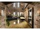 Unique living space showcasing exposed brick, high ceilings, and an open floor plan at 170 Boulevard Se # H523, Atlanta, GA 30312
