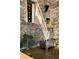 A rustic home office features exposed brick, steel furniture, and a unique industrial aesthetic at 170 Boulevard Se # H523, Atlanta, GA 30312