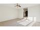 Spacious carpeted bedroom with diagonal wood paneling and a ceiling fan at 2654 Jefferson Ter, Atlanta, GA 30344