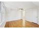 Bright bedroom boasts hardwood floors, ceiling fan, and ample natural light at 2654 Jefferson Ter, Atlanta, GA 30344