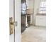 View of the kitchen with stainless steel appliances through a doorway with a glass knob at 2654 Jefferson Ter, Atlanta, GA 30344