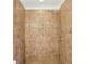 A fully tiled shower features a modern shower head and decorative tile border at 2654 Jefferson Ter, Atlanta, GA 30344