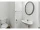 Half bathroom featuring a toilet and pedestal sink at 3277 Wyesham Cir, Duluth, GA 30096