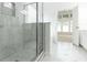 Updated bathroom with glass enclosed shower and marble floors at 3277 Wyesham Cir, Duluth, GA 30096