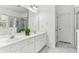 Bathroom featuring double sinks, large mirror, and walk-in shower at 3277 Wyesham Cir, Duluth, GA 30096