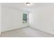 Bright bedroom features neutral carpet, white walls, and window with natural light at 3277 Wyesham Cir, Duluth, GA 30096