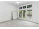 Bright bedroom with large windows and a mattress on the floor at 3277 Wyesham Cir, Duluth, GA 30096