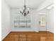 Bright dining room featuring hardwood floors and white walls at 3277 Wyesham Cir, Duluth, GA 30096
