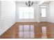 Bright dining room with hardwood floors and white walls at 3277 Wyesham Cir, Duluth, GA 30096