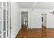 Bright foyer with hardwood floors and white trim at 3277 Wyesham Cir, Duluth, GA 30096
