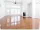 Bright living room with hardwood floors, fireplace, and many windows for natural light at 3277 Wyesham Cir, Duluth, GA 30096
