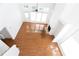Second story view of the home's living room with hardwood floors, fireplace, and many windows at 3277 Wyesham Cir, Duluth, GA 30096