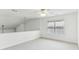 Open loft area with a ceiling fan at 3277 Wyesham Cir, Duluth, GA 30096