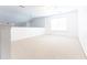 Bright loft area featuring neutral carpet, fresh white walls, and natural light from the window at 3277 Wyesham Cir, Duluth, GA 30096