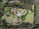 Aerial view of property highlighting lot lines, home and outbuildings at 512 E Valley Ne Rd, Rydal, GA 30171