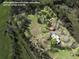 Aerial view of property highlighting lot lines, home and outbuildings at 512 E Valley Ne Rd, Rydal, GA 30171
