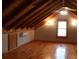 Cozy bedroom featuring wood ceiling, hardwood flooring, and natural lighting at 512 E Valley Ne Rd, Rydal, GA 30171