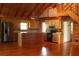 Spacious kitchen featuring wood cabinets, stainless steel appliances, and center island at 512 E Valley Ne Rd, Rydal, GA 30171