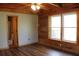 Main bedroom featuring a bathroom, hardwood floors and accents, and lots of natural light at 512 E Valley Ne Rd, Rydal, GA 30171