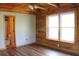 Main bedroom featuring a bathroom, hardwood floors and accents, and lots of natural light at 512 E Valley Ne Rd, Rydal, GA 30171