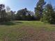 View of the home lot featuring a grass lawn with room for recreation or pets at 512 E Valley Ne Rd, Rydal, GA 30171