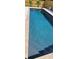 This beautiful swimming pool has a cool deck and an inviting, clear blue water surface at 939 Brittfield Way, Loganville, GA 30052
