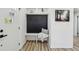 Organized entryway featuring a built-in bench, hooks, and storage, offering a welcoming space at 863 Birch St, Forest Park, GA 30297