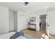 Main bedroom featuring wood-look floors and view to hall at 863 Birch St, Forest Park, GA 30297