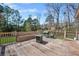 Back deck features bench seating and a grill at 100 Cowan Trl, Stockbridge, GA 30281