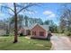Charming ranch-style home with a well-manicured lawn, and inviting curb appeal at 100 Cowan Trl, Stockbridge, GA 30281