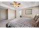 Spacious main bedroom featuring tray ceiling, and carpet flooring at 100 Cowan Trl, Stockbridge, GA 30281