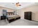 Spacious main bedroom featuring tray ceiling, and an ensuite bathroom at 100 Cowan Trl, Stockbridge, GA 30281