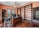 Office features a large built-in bookcase and hardwood flooring at 100 Cowan Trl, Stockbridge, GA 30281