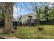 View of home's backyard featuring a dark deck and fenced-in yard at 3020 Harold Se Ave, Atlanta, GA 30316