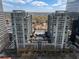 Stunning high-rise condos featuring balconies, swimming pool, and a landscaped deck area at 923 Peachtree Ne St # 930, Atlanta, GA 30309