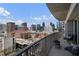 Balcony view overlooking the city skyline with seating at 923 Peachtree Ne St # 930, Atlanta, GA 30309