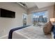 The bedroom provides great city views from the walkout balcony at 923 Peachtree Ne St # 930, Atlanta, GA 30309