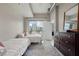 Bedroom with two beds and walk out balcony with city views at 923 Peachtree Ne St # 930, Atlanta, GA 30309
