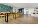 Coworking space featuring a long table with stools, and a lounge area at 923 Peachtree Ne St # 930, Atlanta, GA 30309