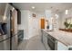 Bright kitchen with stainless steel appliances, a large island, and plenty of cabinet space at 923 Peachtree Ne St # 930, Atlanta, GA 30309
