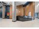 Stylish lobby with modern reception desk and marble floors at 923 Peachtree Ne St # 930, Atlanta, GA 30309