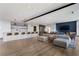 Resident lounge with a bar, tv, modern furniture, and plenty of space for entertaining at 923 Peachtree Ne St # 930, Atlanta, GA 30309