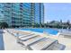 Luxurious pool area with comfortable lounge chairs offering a perfect spot to relax and enjoy the sun at 923 Peachtree Ne St # 930, Atlanta, GA 30309