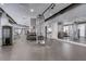 Bright fitness center with a variety of equipment, including machines and free weights, for a comprehensive workout routine at 923 Peachtree Ne St # 930, Atlanta, GA 30309