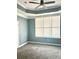 Bedroom featuring a ceiling fan, neutral walls, and plush carpeting at 971 Martin Se St, Atlanta, GA 30315