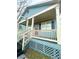 Inviting home featuring a covered porch, wood trim and a cozy aesthetic at 971 Martin Se St, Atlanta, GA 30315
