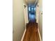 Hallway with hardwood floors, offering a clear path through the home's layout at 971 Martin Se St, Atlanta, GA 30315
