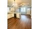 Eat-in kitchen features granite counters, an island, and hardwood floors at 971 Martin Se St, Atlanta, GA 30315
