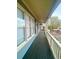 Spacious covered porch showcasing its plank flooring and charming curb appeal at 971 Martin Se St, Atlanta, GA 30315